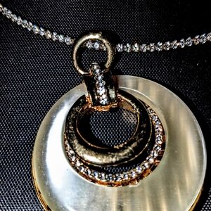 Elegant Gold and Silver tone Pendant Necklace